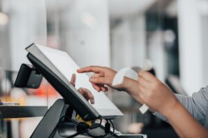 woman using a pos system